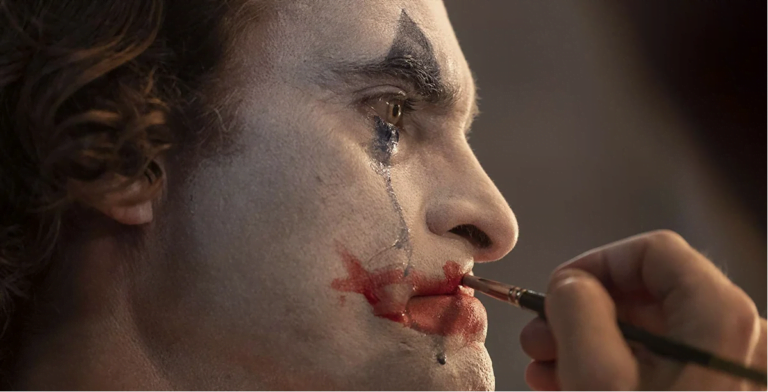 Joker Movie Makeup & Masks Being Worn By Protesters Worldwide